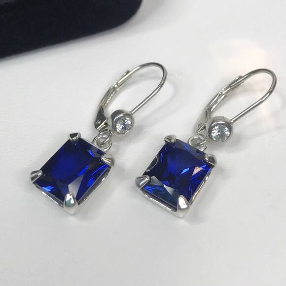Jas Jacobs Jewelry Jewelry - Beautiful 8ctw Emerald Cut Lab Grown Sapphire Earrings in Sterling Silver